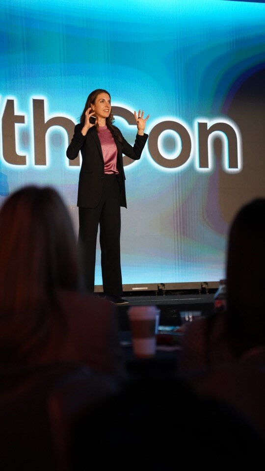 Kristin Messerli on stage at GrowthCon.